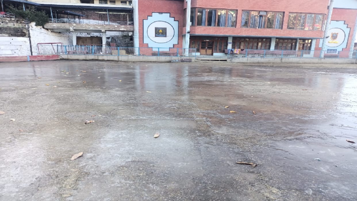 Frozen ice layer in ice skating rink, preparation for trial in two days