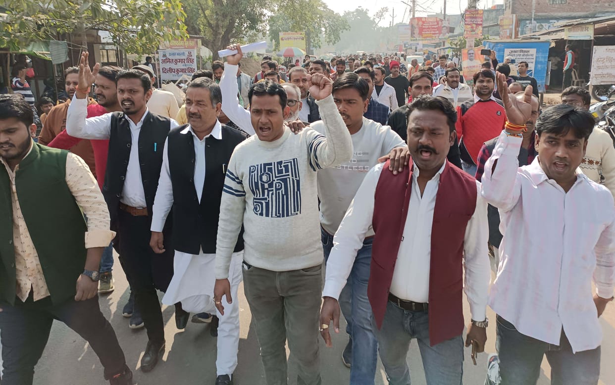 businessman protest against sgst team