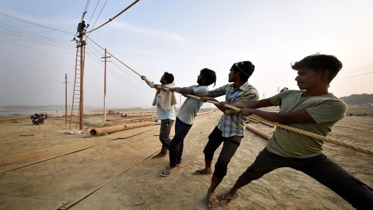 Before electricity connection in camps of Kalpavasis in Magh Mela, game in tender