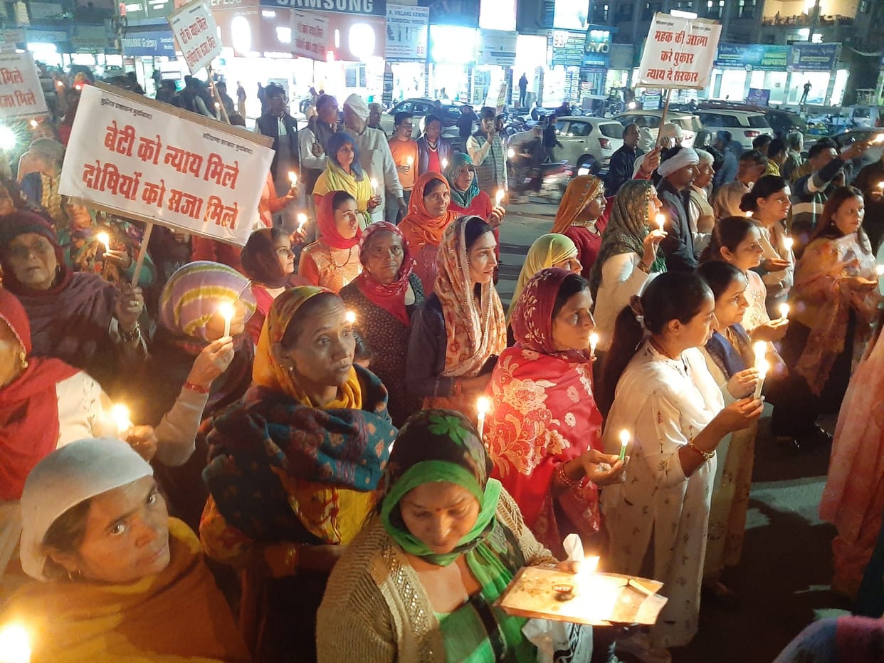 Candle march taken out to get justice for the teenager