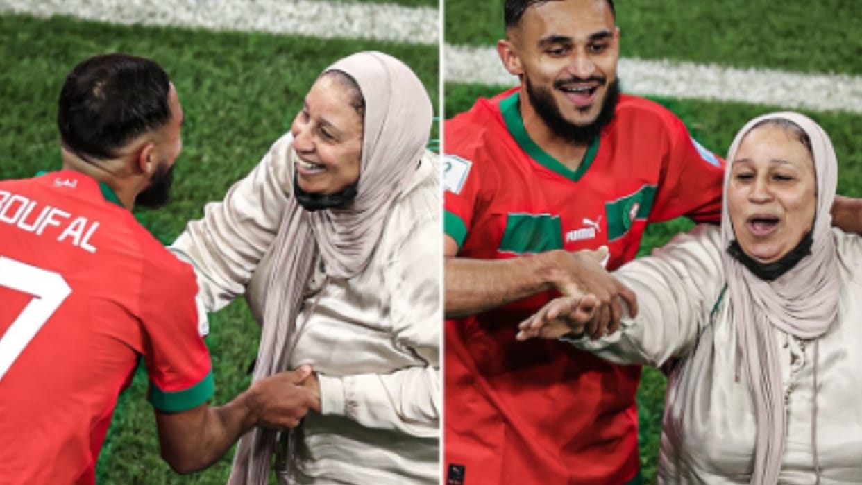 Moroccan footballer Sofiane Boufal dance her mother at the stadium after defeat Portugal in the quarterfinals