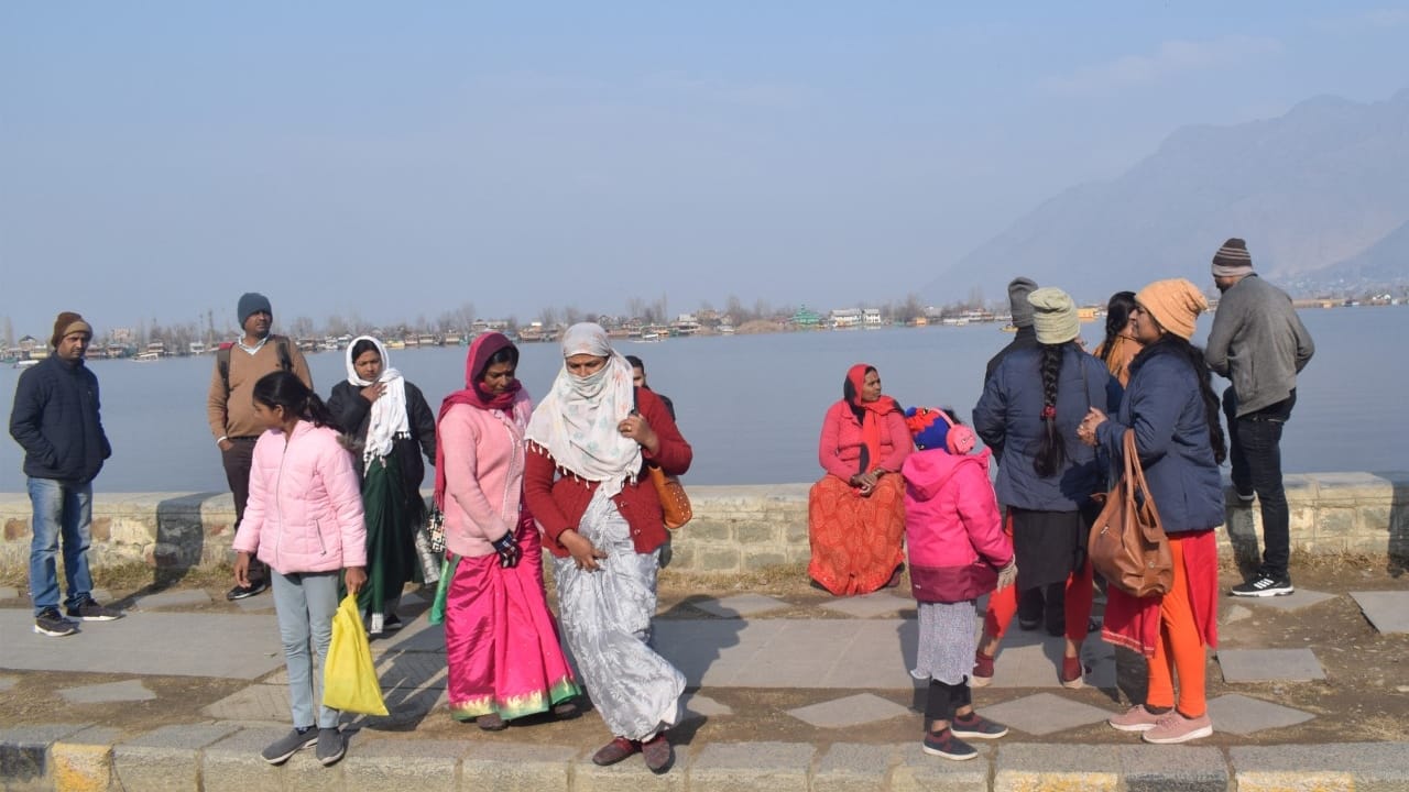 Kashmir winter photos story witnessed sunny day on Monday with some respite in cold during nights