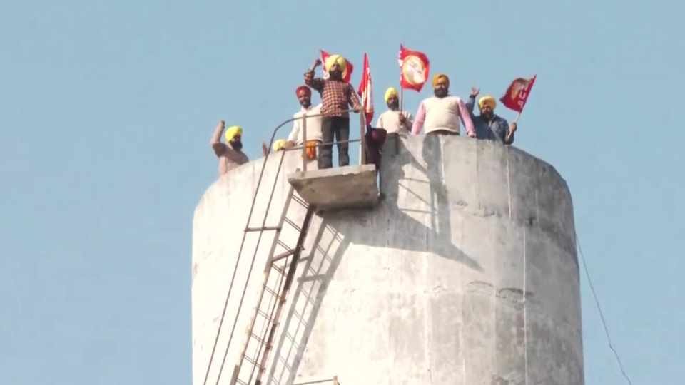 Employees climbed on water tank in Amritsar of Punjab