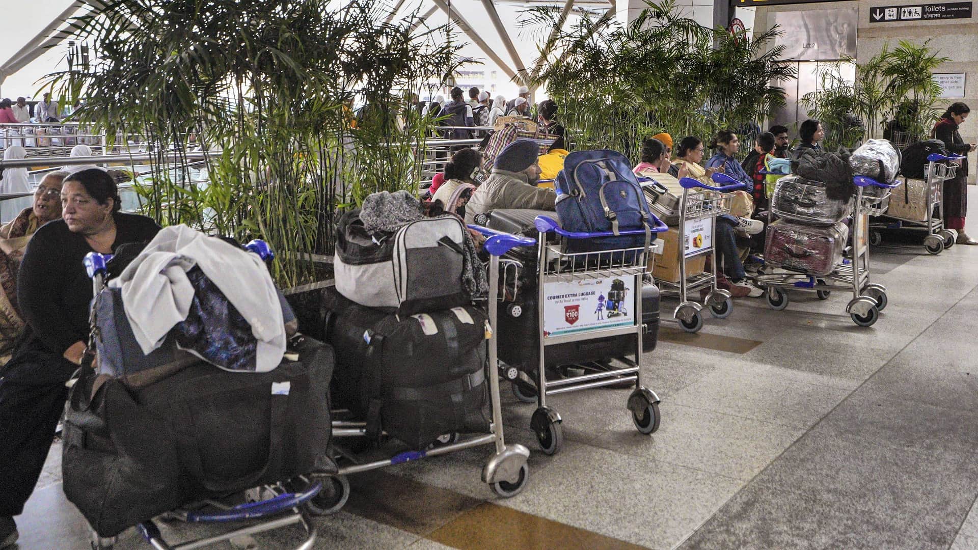 Crowd at IGI airport Delhi Domestic passengers increased commuters get irritated