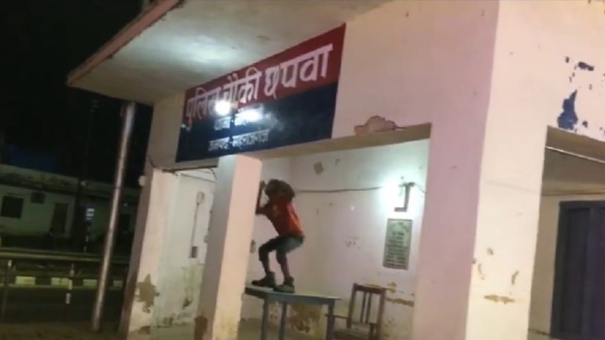 Mentally retarded youth dancing on table in police booth video viral