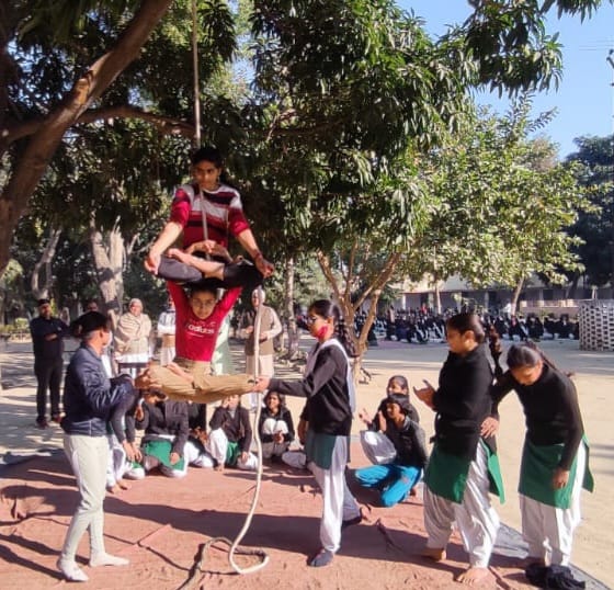 Girl students did yoga on the rope