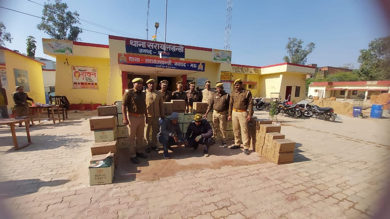 illegal Liquor worth of many lakhs was being taken to Bihar by hiding it in tractor trolley in mau