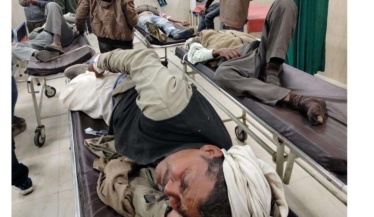 Pickup filled with peanuts overturned on the highway in Farrukhabad