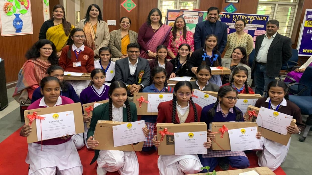 winners of California NGO tournament 15 girl students have been given laptops by GNCT