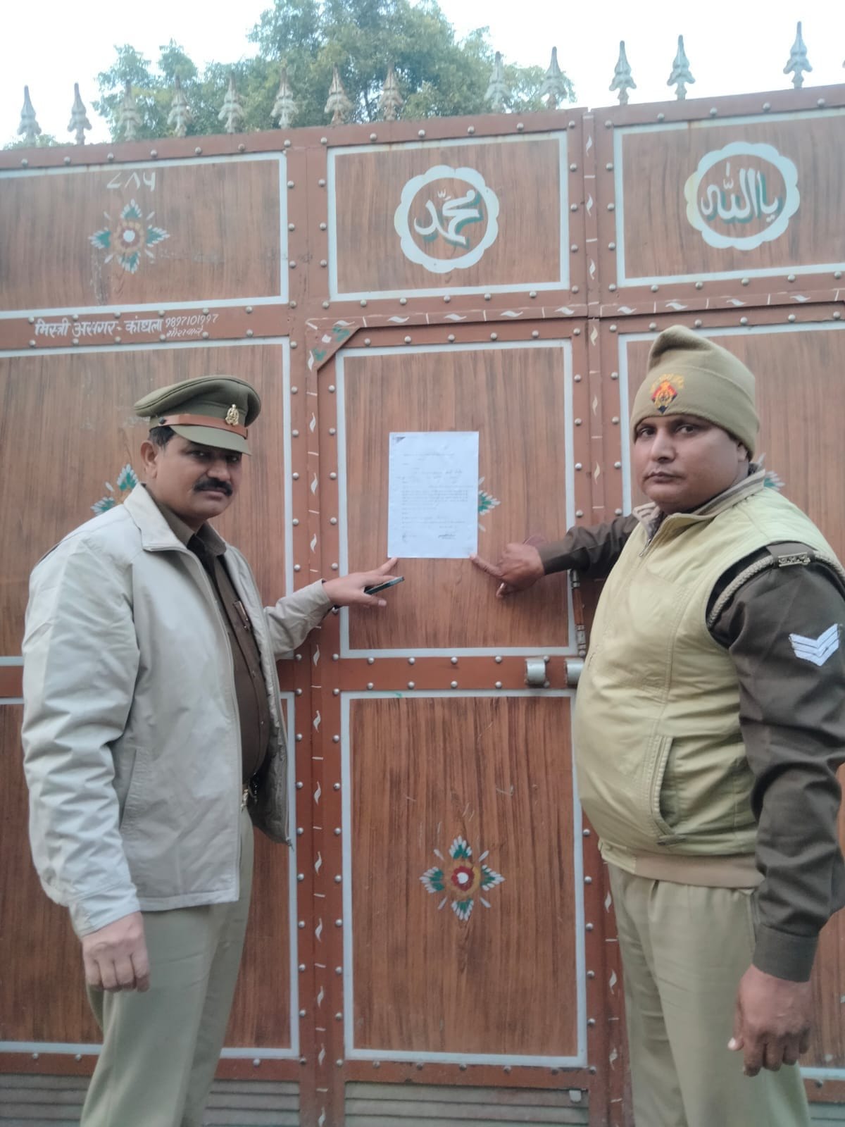 Notice of attachment pasted at the house of absconding accused of murder of mother daughter