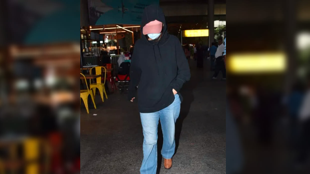 Shehnaaz Gill trolled for covering her entire face at airport netizens compare her look with Raj Kundra