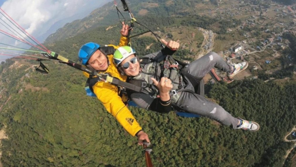 Film actor Vivek Oberoi paragliding from Sarangkot Nepal