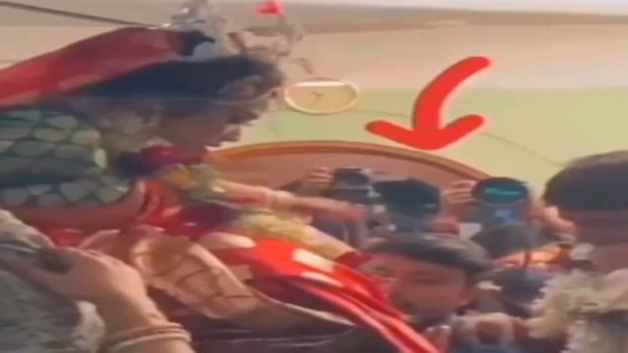 Funny Wedding Video bride hold a boy hair while boys lifted her funny video viral on social media