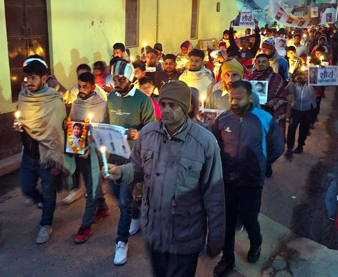 Candle march taken out, effigies of the murderers burnt