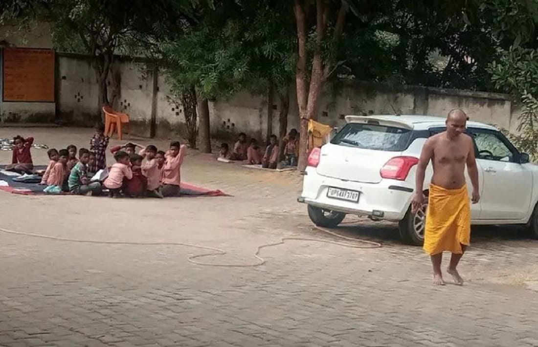 Video of headmaster washing car in school premises goes viral Sonbhadra BSA takes action