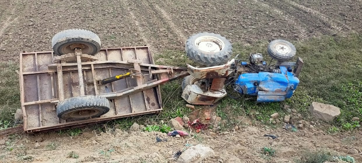 Driver died due to overturning of tractor-trolley
