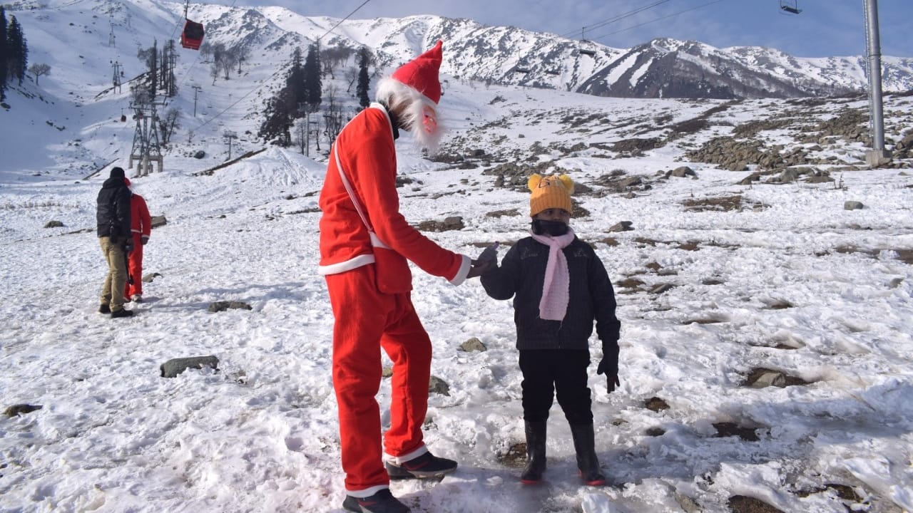 kashmir Santa claus appears on Christmas festival at world famous Ski resort in Gulmarg