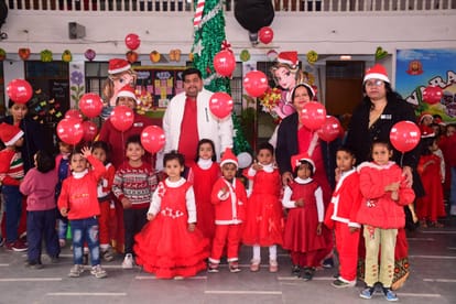 Merry christmas 2022 Children celebrated Christmas carnival, children danced on Jingle Bell in Santa's costume