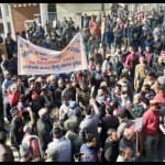 धर्म परिवर्तन को लेकर व्यापारियों ने किया धरना प्रदर्शन
