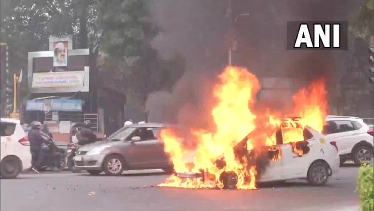 Car catches fire at busy ITO intersection in delhi