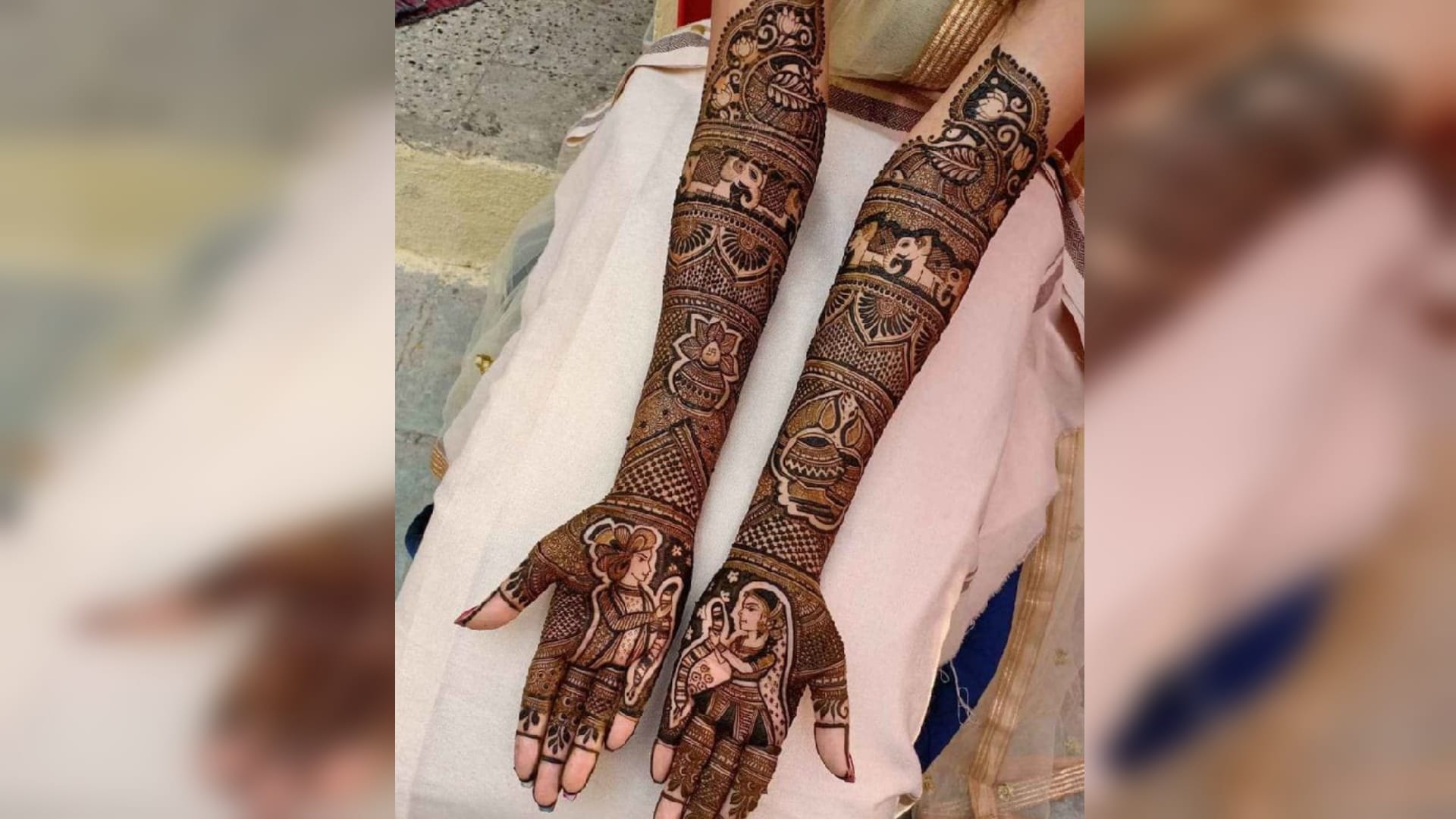 Bride needs her face shape with husband on henna hands