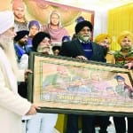 जम्मू में कार्यक्रम के दौरान एलजी और अन्य
