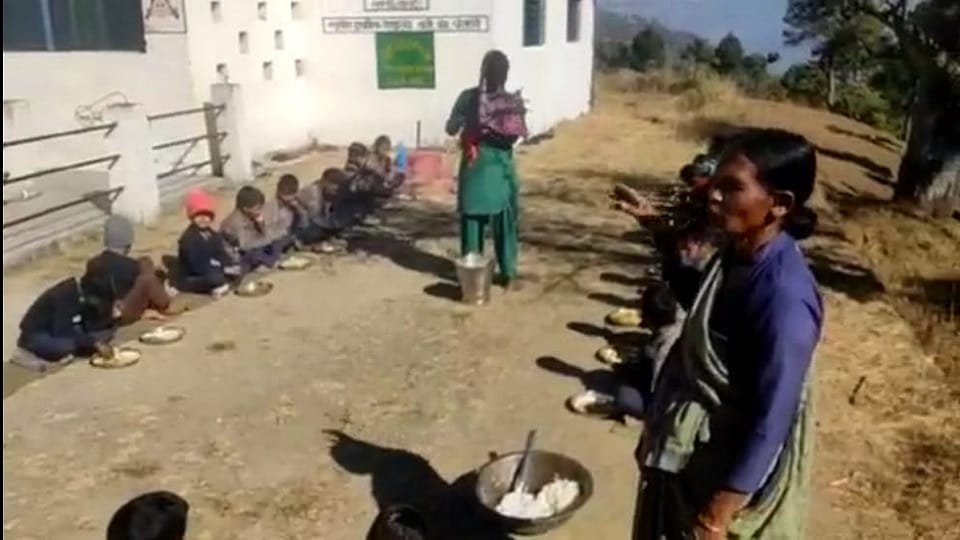 Video of serving food to children in school by making them sit in two separate rows goes viral
