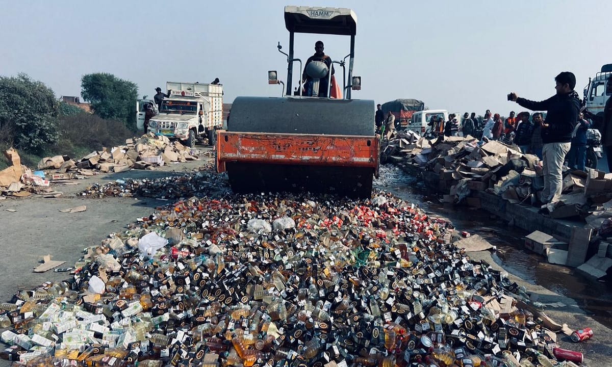 Road roller ran on bottles of English liquor worth Rs 58 lakh in chandauli police recovered from smugglers