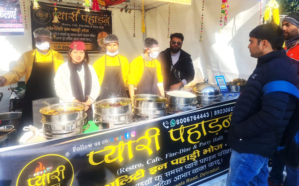 Tourists enjoying mountain cuisine