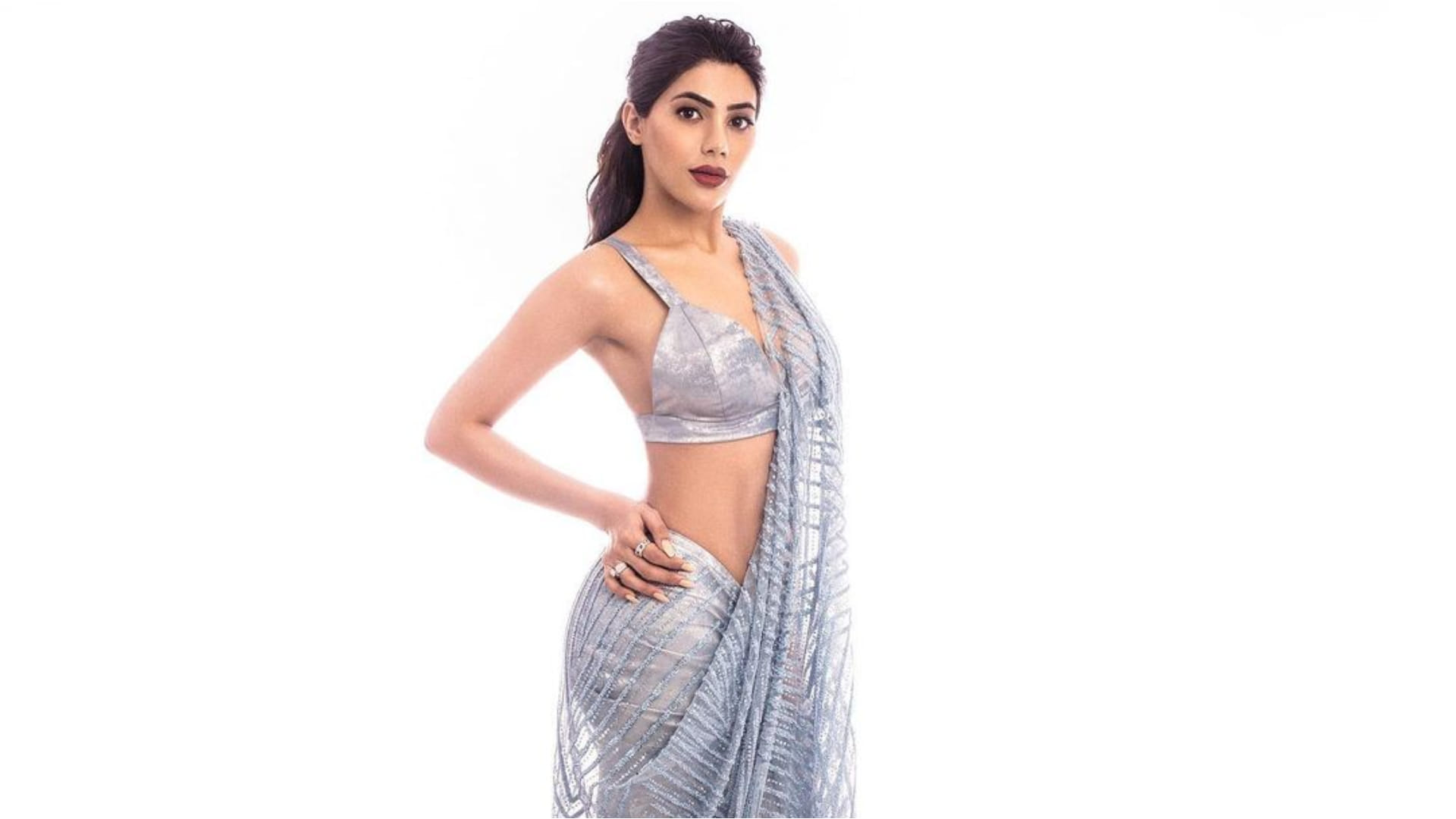 nikki tamboli silver sheer saree with bikini blouse design looks sultry
