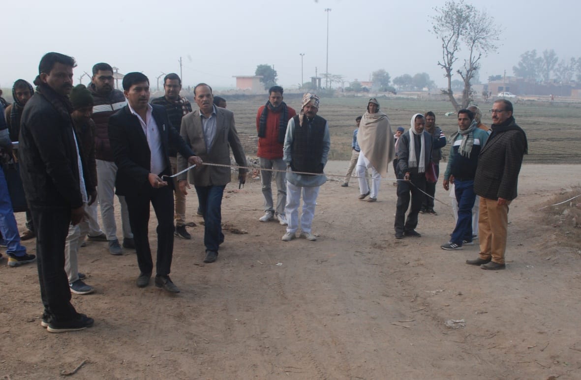 Bulldozer running in Yamuna Khadar