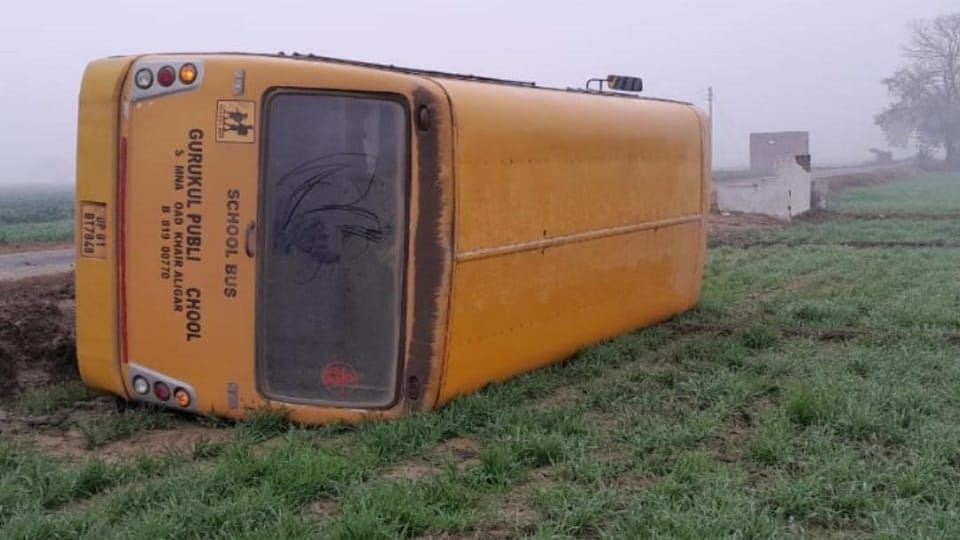 school bus overturned in the field  eight children in the Bus