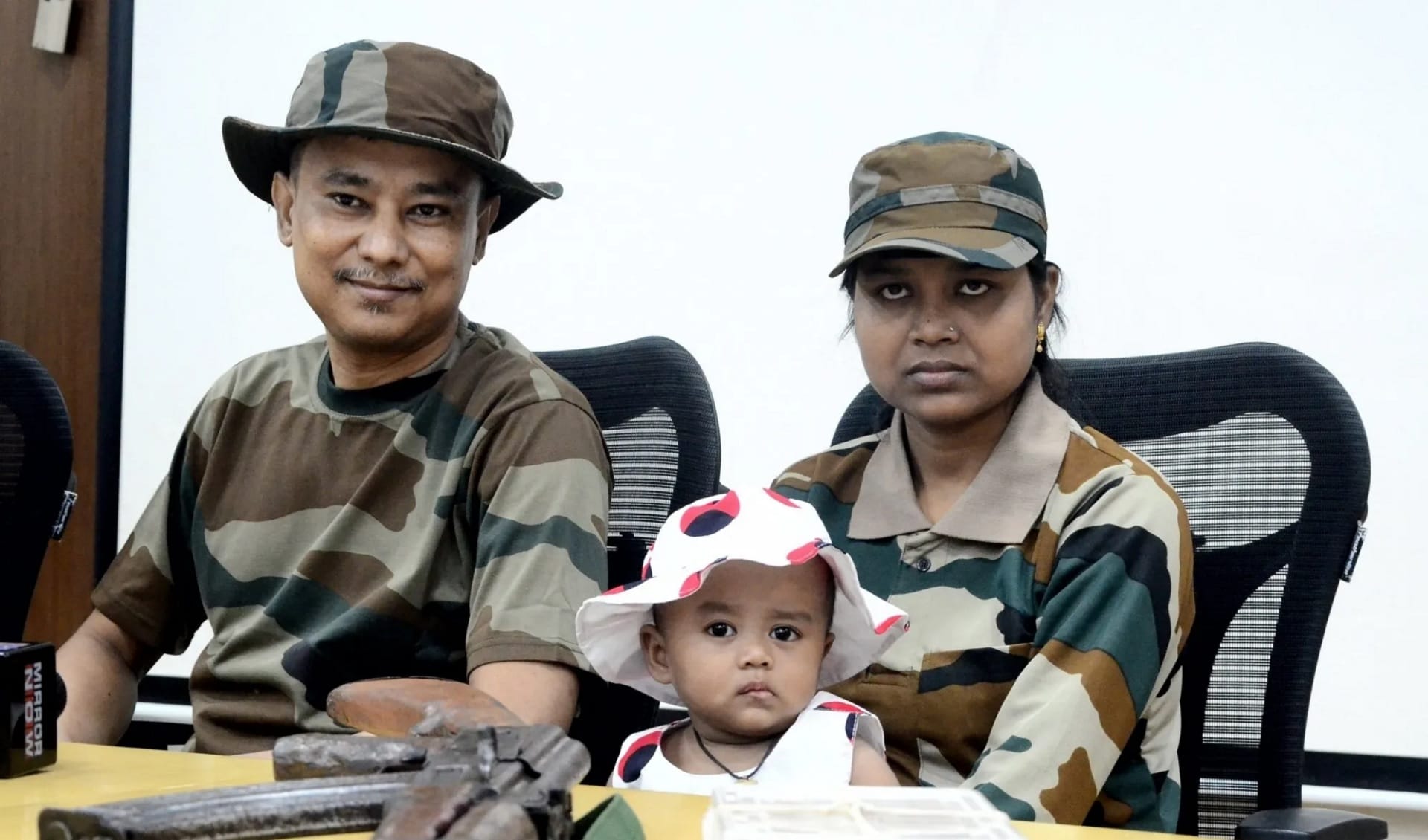 Kamtapur Liberation Organisation (KLO) general secretary Kailash Koch with his wife and child