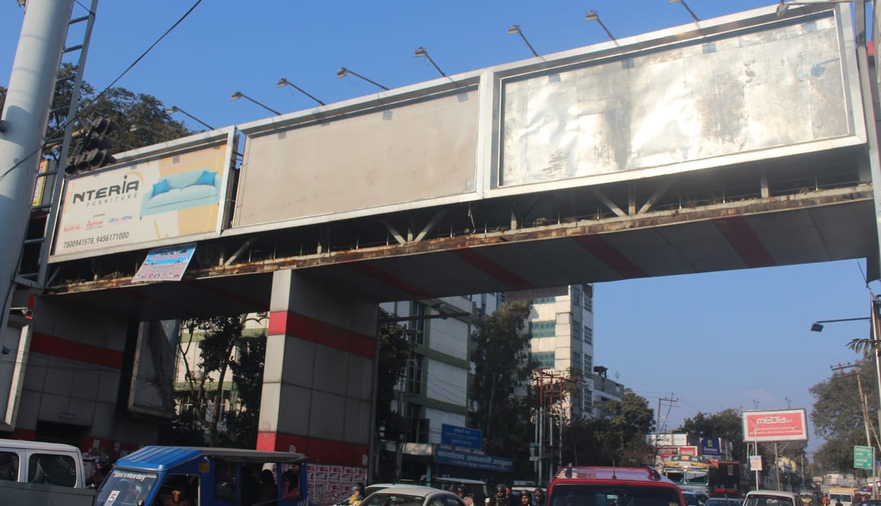Only advertisements run on the city's only foot over bridge