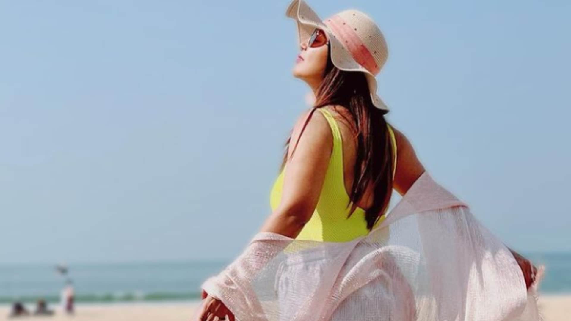 Debina bonnerjee Share Photos of goa beach in yellow Swimsuit Enjoying With Gurmeet Chaudhary daughter Lianna