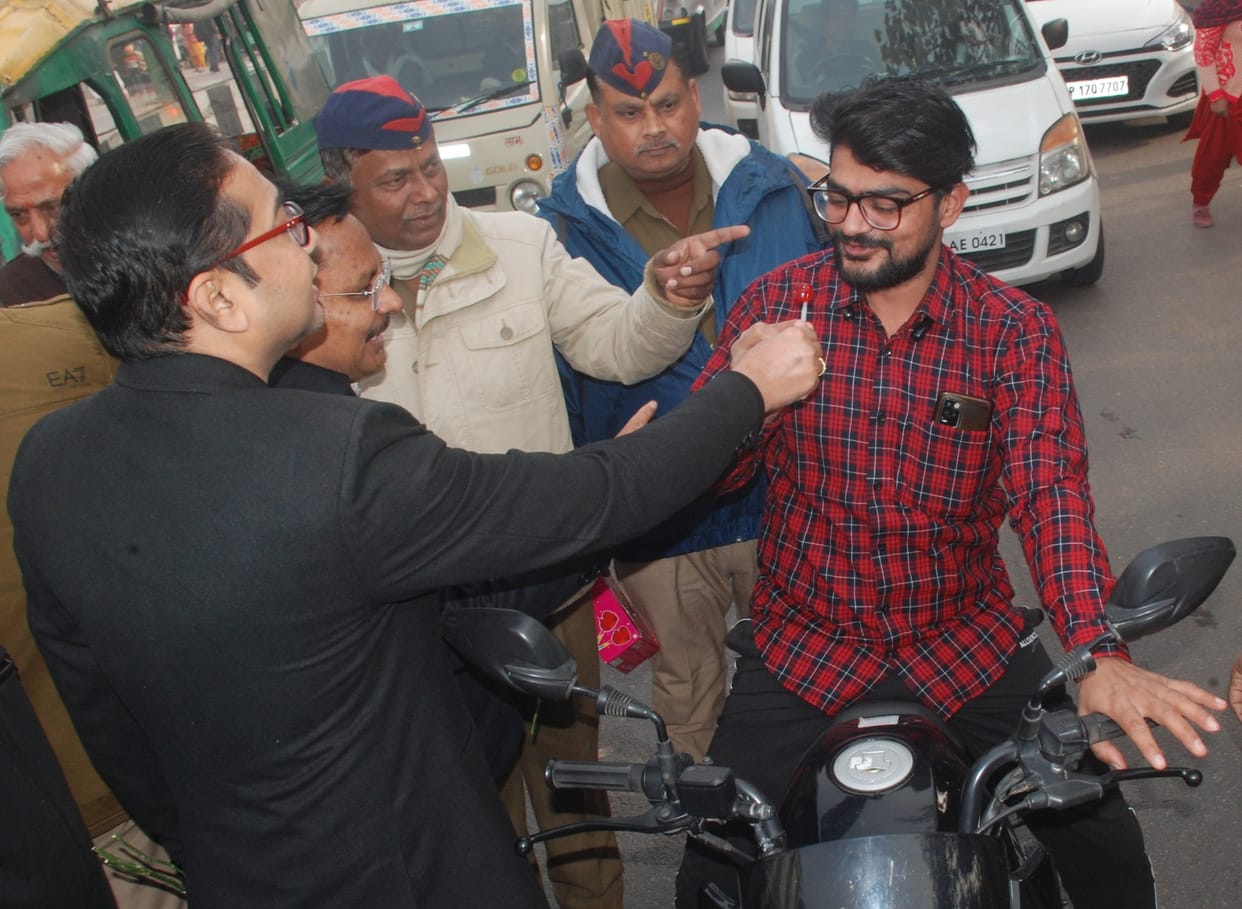 Explain traffic rules, warn of action for violation