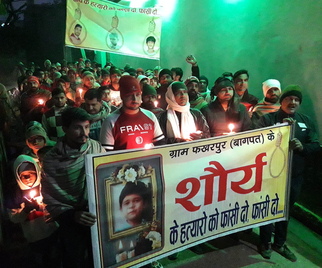 Villagers take out candle march in Fakharpur