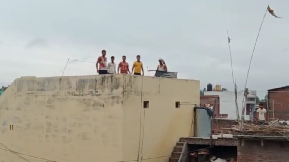 victim family members stone pelting on accused house video goes viral