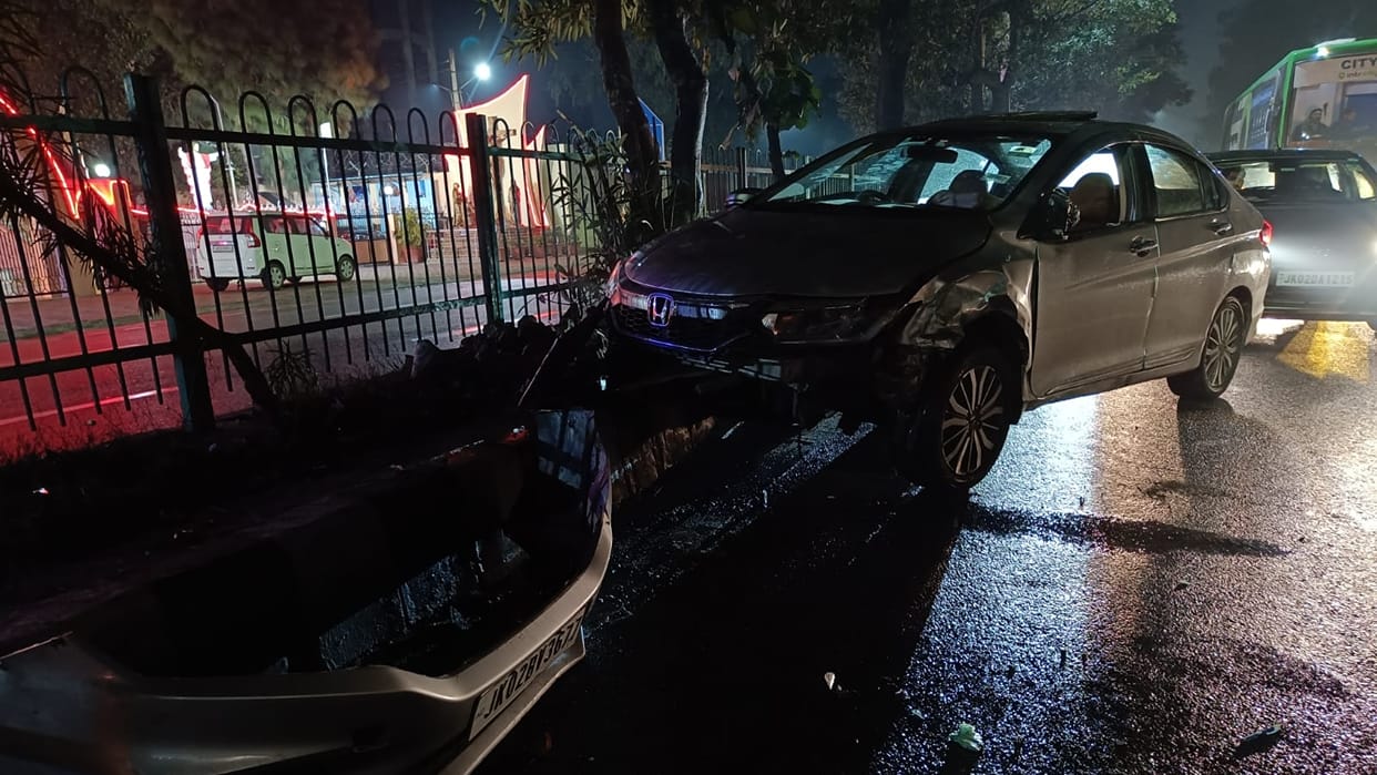 Handa car rammed climbed onto divider in Gandhinagar  Jammu City people narrowly escaped
