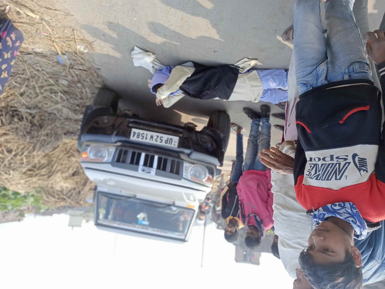Young man lying on the road to get ration card