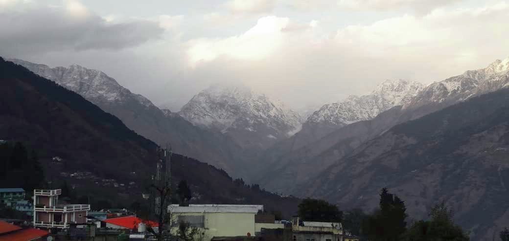 Snowfall on high peaks increased chill across the district