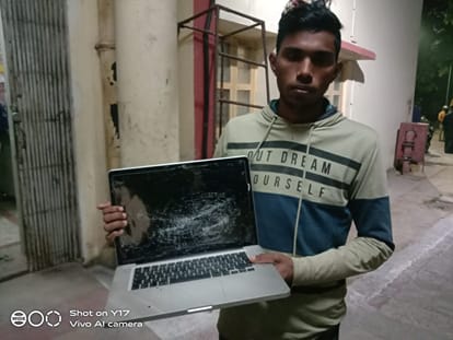 Fighting with students in BHU Moona Devi Hostel four injured broke laptop after entering room
