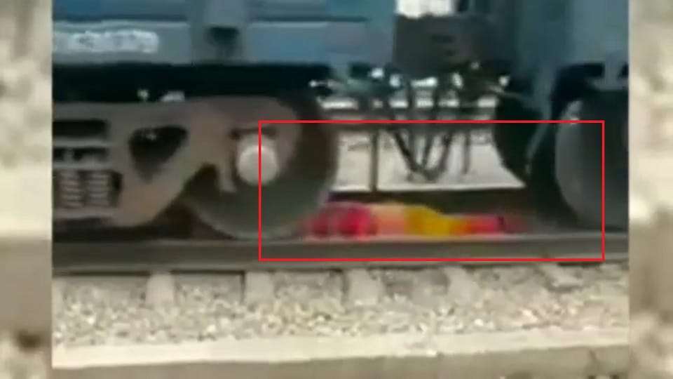 Faridabad goods train ran over a woman while she crossing railway line video went viral