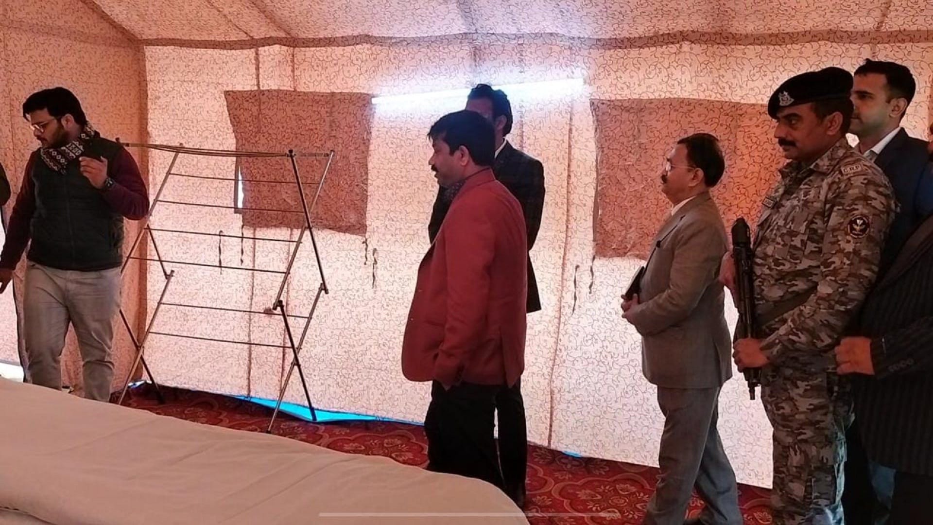 Tent city ready for Magh Mela sit in the lounge of deluxe cottage and see Ganga