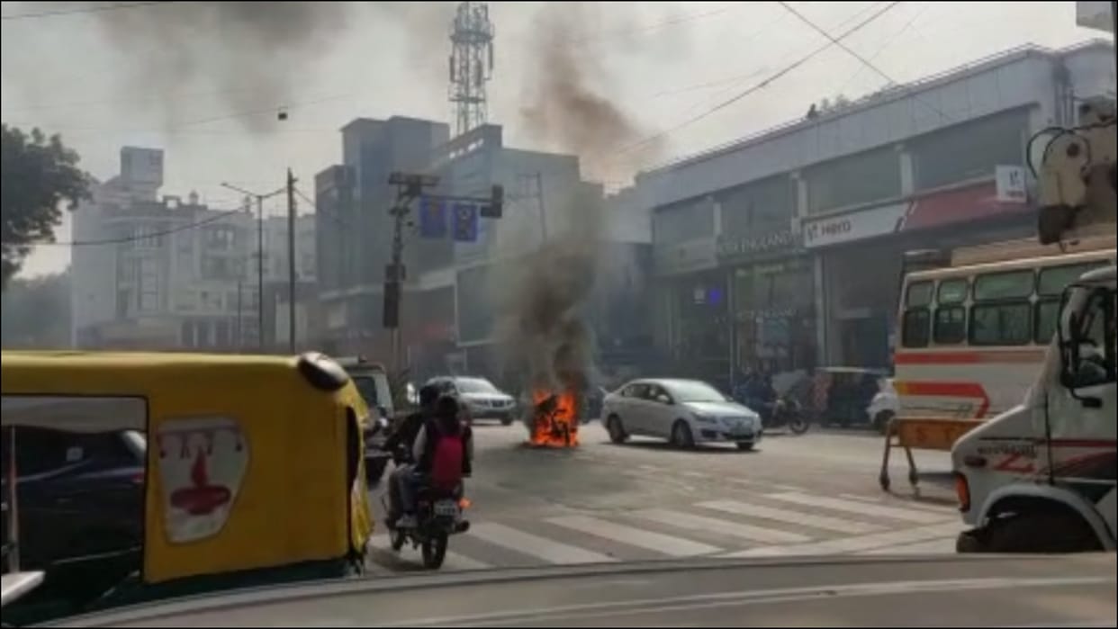 young man sets fire new bike in front of bike agency in gwalior