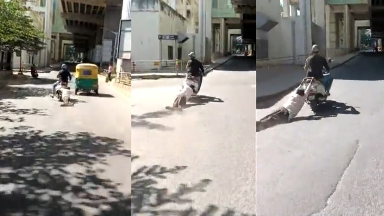 Video Man being dragged behind a scooter on Bengaluru Magadi road two-wheeler driver has been apprehended