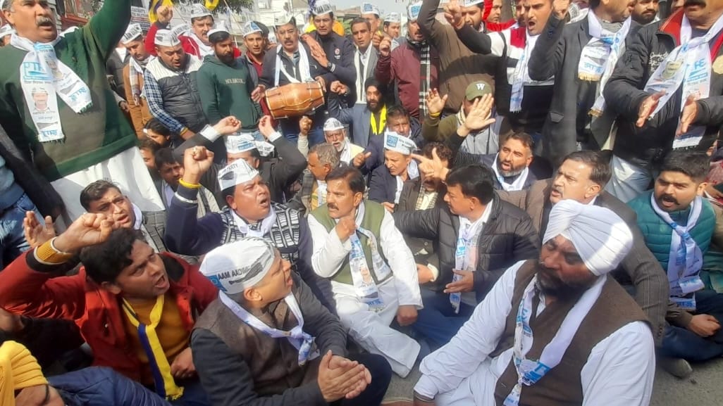jammu kashmir aam admi party protest against new land order