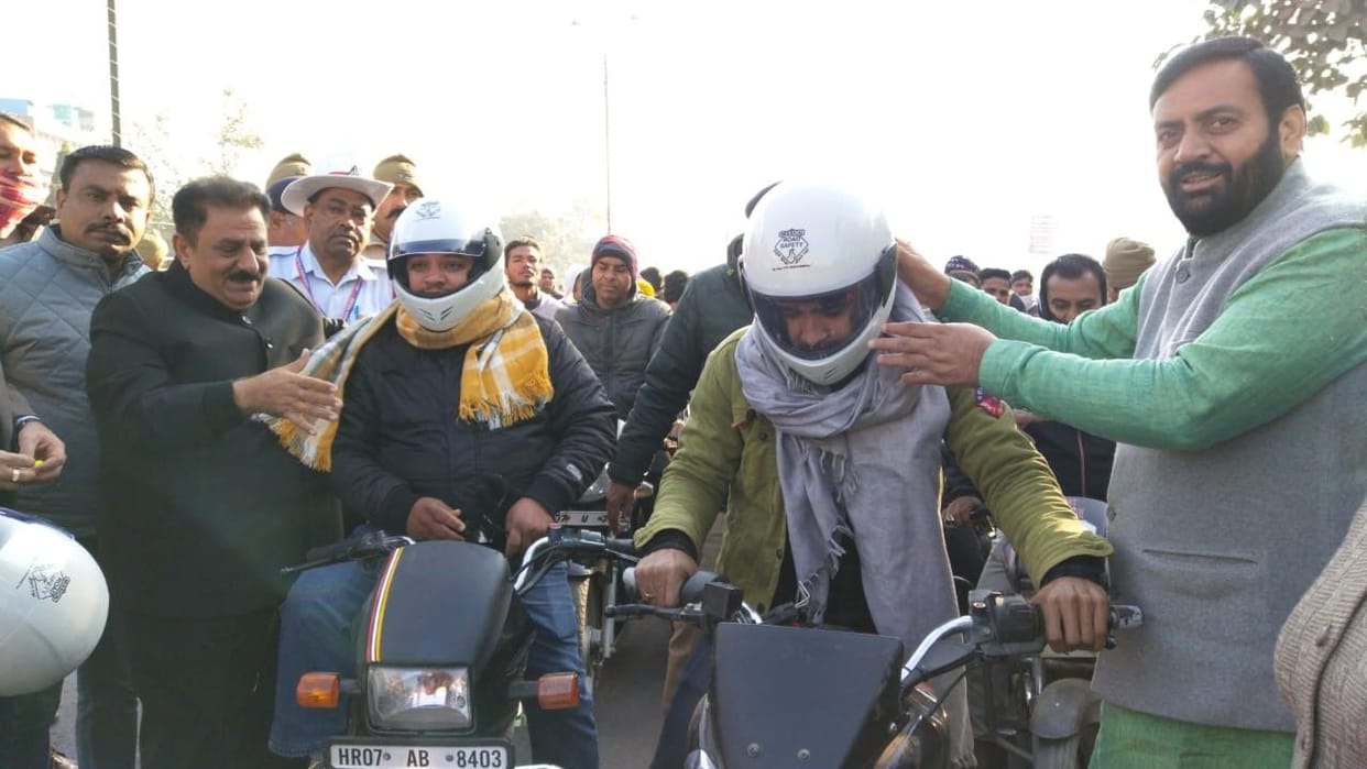 MP Naib Singh Saini and MLA Subhash Sudha distributed helmets to the people