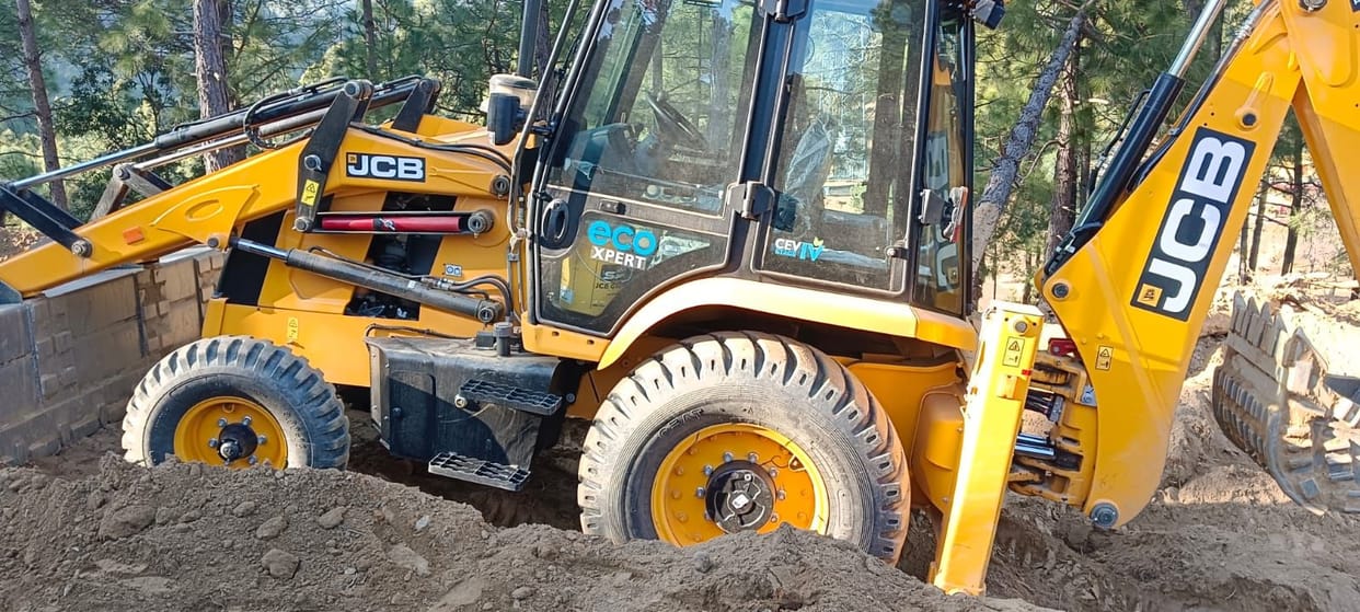 JCB Runs On Land Without Permission