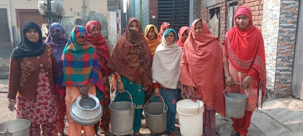 Women demonstrated with empty utensils